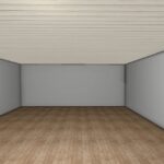 An empty room with gray walls, a wood-striped ceiling, and brown wooden plank flooring viewed from one corner